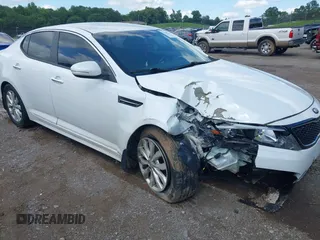 2014 Kia Optima EX z VIN 5XXGN4A72EG313656, wystawiony jako IAAI lot #42370529 z przebiegiem 126 950 mil mil oraz . Historia ofert i sprzedaży dostępna na DreamBid. Obrazek 1.