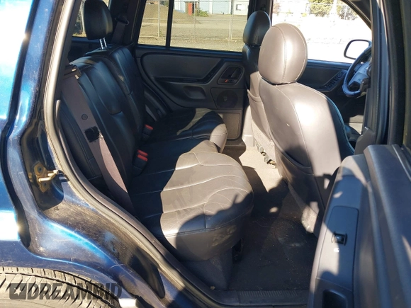 2001 Jeep Grand Cherokee Laredo with VIN 1J4GW48N31C727194, listed as a IAAI auction lot 42703915 with 176,896 mi miles and . Bid and sale history available at DreamBid. Image 8.