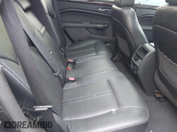 2012 Cadillac SRX Performance Collection z VIN 3GYFNBE39CS641892, wystawiony jako IAAI lot #41395695 z przebiegiem 95 303 mil mil oraz . Historia ofert i sprzedaży dostępna na DreamBid. Obrazek 8.