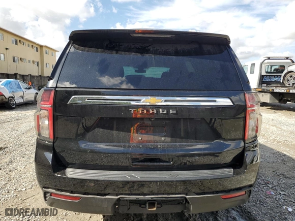 2021 Chevrolet Tahoe LS with VIN 1GNSCMKDXMR311046, listed as a Copart auction lot 85338194 with 71,634 mi miles and Salvage Title. Bid and sale history available at carsss.com. Image 6.