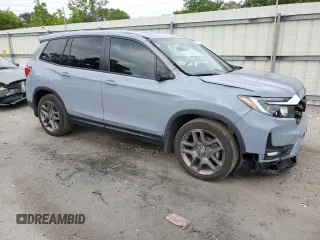 2022 Honda Passport EX-L z VIN 5FNYF7H51NB004450, wystawiony jako Copart lot #54874325 z przebiegiem 33 453 mil mil oraz Szkody całkowita. Historia ofert i sprzedaży dostępna na DreamBid. Obrazek 4.