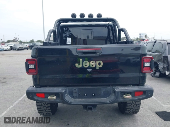2020 Jeep Gladiator Rubicon z VIN 1C6JJTBG7LL102189, wystawiony jako IAAI lot #42320968 z przebiegiem 68 266 mil mil oraz . Historia ofert i sprzedaży dostępna na DreamBid. Obrazek 16.