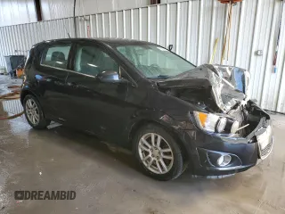 2013 Chevrolet Sonic LT with VIN 1G1JC6SG3D4142228, listed as a Copart auction lot 43033075 with 124,204 mi miles and Salvage Title. Bid and sale history available at carsss.com. Image 4.