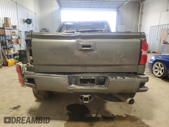 2018 GMC Sierra 2500HD Denali z VIN 1GT12UEY9JF121158, wystawiony jako Copart lot #87449504 z przebiegiem 170 506 mil mil oraz Szkoda całkowita • Salvage title. Historia ofert i sprzedaży dostępna na DreamBid. Obrazek 6.