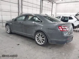 2015 Ford Taurus Limited with VIN 1FAHP2J8XFG192225, listed as a IAAI auction lot 41324244 with 100,395 mi miles. Bid and sale history available at carsss.com. Image 3.