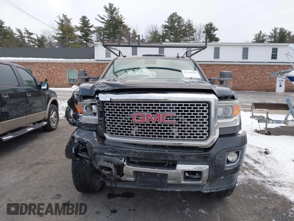 2016 GMC Sierra 2500HD Denali z VIN 1GT12UE81GF128498, wystawiony jako IAAI lot #41346398 z przebiegiem 164 532 mil mil oraz . Historia ofert i sprzedaży dostępna na DreamBid. Obrazek 12.