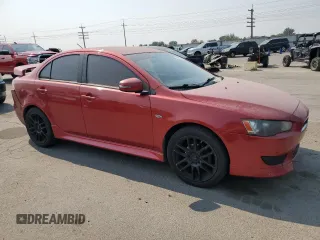 2015 Mitsubishi Lancer ES with VIN JA32U2FU2FU008586, listed as a Copart auction lot 70018914 with 129,990 mi miles and Salvage Title. Bid and sale history available at carsss.com. Image 4.