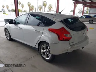 2014 Ford Focus SE with VIN 1FADP3K21EL301336, listed as a IAAI auction lot 41939452 with 118,203 mi miles. Bid and sale history available at carsss.com. Image 3.