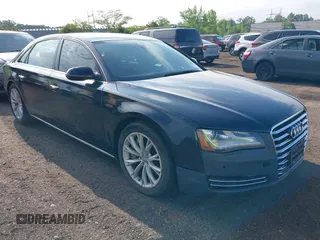 2011 Audi A8 with VIN WAURVAFD4BN018884, listed as a IAAI auction lot 42693000 with 116,952 mi miles and . Bid and sale history available at DreamBid. Image 6.