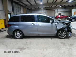 2013 Mazda 5 Sport with VIN JM1CW2BL5D0156684, listed as a IAAI auction lot 41966696 with 121,654 mi miles and . Bid and sale history available at DreamBid. Image 14.
