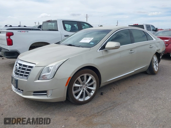 2013 Cadillac XTS Luxury with VIN 2G61P5S30D9132193, listed as a IAAI auction lot 41897709 with 140,780 mi miles and . Bid and sale history available at DreamBid. Image 2.