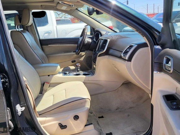 2014 Jeep Grand Cherokee Overland with VIN 1C4RJFCT7EC187319, listed as a Copart auction lot 51196895 with 98,314 mi miles and Clean Title. Bid and sale history available at carsss.com. Image 5.