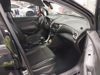 2018 Chevrolet Trax LT with VIN 3GNCJPSB6JL223575, listed as a IAAI auction lot 41986668 with 108,190 mi miles and . Bid and sale history available at carsss.com. Image 5.
