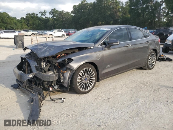 2017 Ford Fusion Titanium z VIN 3FA6P0SU0HR290201, wystawiony jako Copart lot #60106095 z przebiegiem 98 086 mil mil oraz Szkoda całkowita • Salvage title. Historia ofert i sprzedaży dostępna na DreamBid. Obrazek 1.