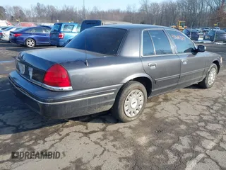 2005 Ford Police Interceptor z VIN 2FAHP71W95X170821, wystawiony jako IAAI lot #41538727 z przebiegiem 115 722 mil mil oraz . Historia ofert i sprzedaży dostępna na DreamBid. Obrazek 4.
