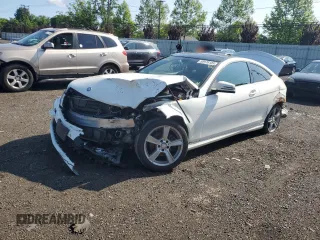 2015 Mercedes-Benz C 250 with VIN WDDGJ4HB0FG389236, listed as a Copart auction lot 58976105 with 93,291 mi miles and Salvage title. Bid and sale history available at DreamBid. Image 1.