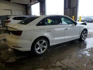 2017 Audi A3 Premium z VIN WAUAUGFFXH1056382, wystawiony jako Copart lot #56946195 z przebiegiem 162 612 mil mil oraz Szkoda całkowita • Salvage title. Historia ofert i sprzedaży dostępna na DreamBid. Obrazek 3.