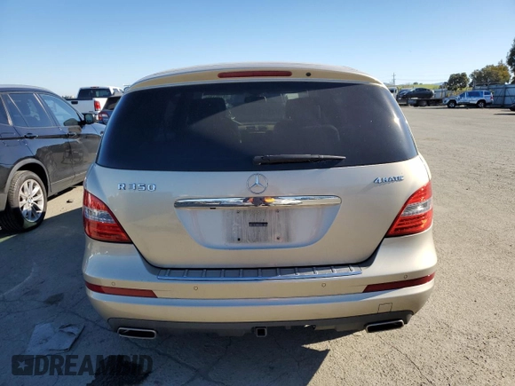 2012 Mercedes-Benz R 350 z VIN 4JGCB5HE2CA139450, wystawiony jako Copart lot #88705135 z przebiegiem 132 689 mil mil oraz Szkoda całkowita • Salvage title. Historia ofert i sprzedaży dostępna na DreamBid. Obrazek 6.