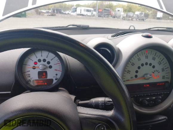 2012 MINI Countryman S with VIN WMWZC5C56CWM13283, listed as a IAAI auction lot 42093902 with 230,000 mi miles and . Bid and sale history available at DreamBid. Image 7.