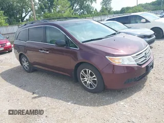 2011 Honda Odyssey EX-L with VIN 5FNRL5H6XBB096891, listed as a IAAI auction lot 42840531 with 214,842 mi miles and . Bid and sale history available at DreamBid. Image 1.