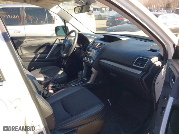 2016 Subaru Forester 2.0XT Premium with VIN JF2SJGDC3GH527384, listed as a IAAI auction lot 41763974 with 107,411 mi miles. Bid and sale history available at carsss.com. Image 5.
