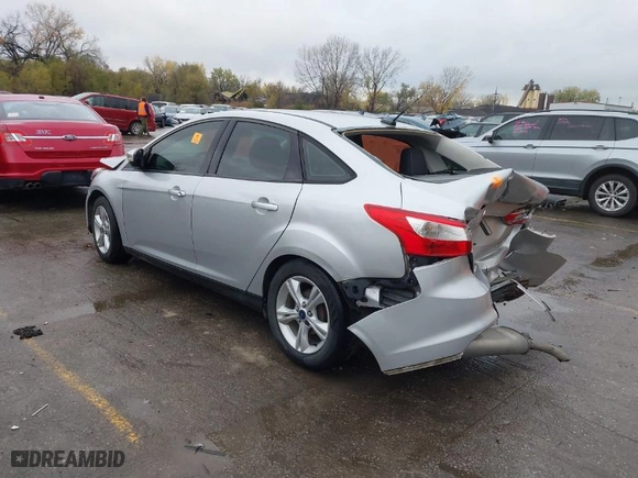 2014 Ford Focus SE with VIN 1FADP3F20EL406508, listed as a IAAI auction lot 40809098 with 89,731 mi miles. Bid and sale history available at carsss.com. Image 3.