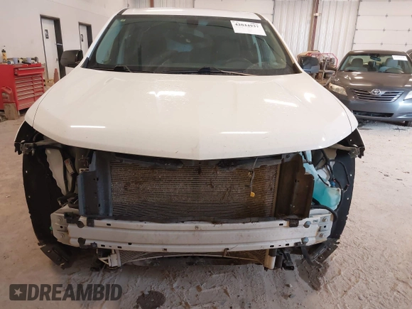 2021 Chevrolet Traverse LS with VIN 1GNERFKW8MJ166905, listed as a IAAI auction lot 42044937 with 96,542 mi miles and . Bid and sale history available at DreamBid. Image 6.