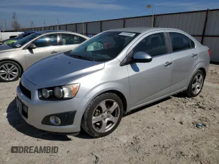 2012 Chevrolet Sonic LTZ z VIN 1G1JE5SH5C4180409, wystawiony jako Copart lot #45701885 z przebiegiem 169 982 mil mil oraz Czysty tytuł • Clean title. Historia ofert i sprzedaży dostępna na DreamBid. Obrazek 1.
