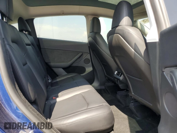 2024 Tesla Model Y with VIN 7SAYGDED0RF102479, listed as a Copart auction lot 55431975 with 23,989 mi miles and Salvage title. Bid and sale history available at DreamBid. Image 11.
