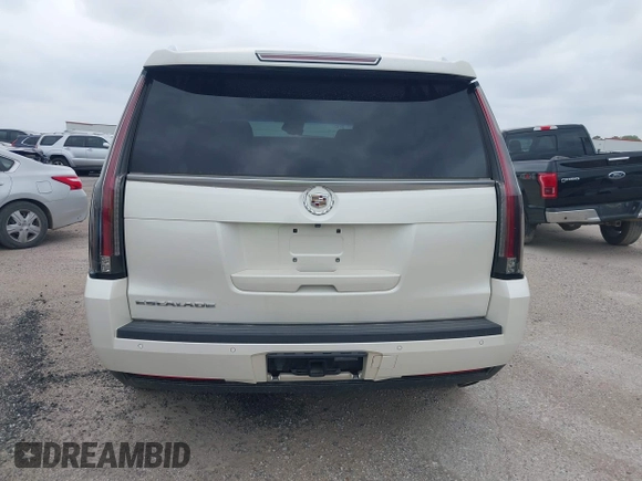 2015 Cadillac Escalade Premium z VIN 1GYS4CKJ4FR216873, wystawiony jako IAAI lot #41677234 z przebiegiem 128 990 mil mil oraz . Historia ofert i sprzedaży dostępna na DreamBid. Obrazek 16.