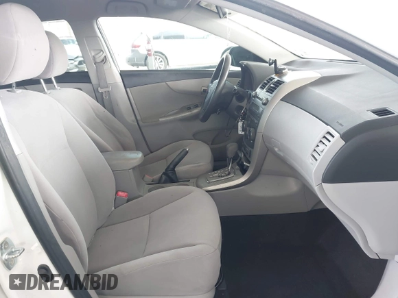 2011 Toyota Corolla L with VIN JTDBU4EE9B9131113, listed as a IAAI auction lot 42028423 with 191,157 mi miles. Bid and sale history available at carsss.com. Image 5.