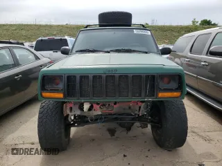 1998 Jeep Cherokee Sport with VIN 1J4FJ68SXWL210381, listed as a Copart auction lot 58398995 with 211,870 mi miles and Salvage title. Bid and sale history available at DreamBid. Image 5.