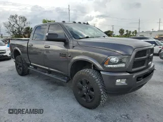 2016 Ram 2500 Laramie with VIN 3C6UR5FLXGG230499, listed as a Copart auction lot 60672185 with 152,049 mi miles and Salvage title. Bid and sale history available at DreamBid. Image 4.