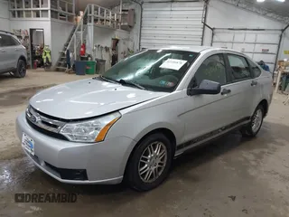 2011 Ford Focus SE with VIN 1FAHP3FN1BW120916, listed as a IAAI auction lot 42106878 with 107,166 mi miles. Bid and sale history available at carsss.com. Image 2.