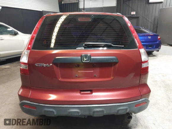 2009 Honda CR-V LX with VIN JHLRE48339C018957, listed as a IAAI auction lot 41952951 with 76,502 mi miles. Bid and sale history available at carsss.com. Image 16.