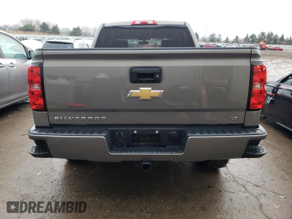 2017 Chevrolet Silverado 1500 LT with VIN 3GCUKREC0HG287527, listed as a Copart auction lot 84900274 with 121,617 mi miles and Salvage Title. Bid and sale history available at DreamBid. Image 6.