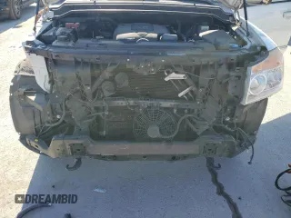 2015 Nissan Armada Platinum z VIN 5N1BA0NE1FN621958, wystawiony jako Copart lot #88787805 z przebiegiem 132 873 mil mil oraz Szkoda całkowita • Salvage title. Historia ofert i sprzedaży dostępna na DreamBid. Obrazek 13.