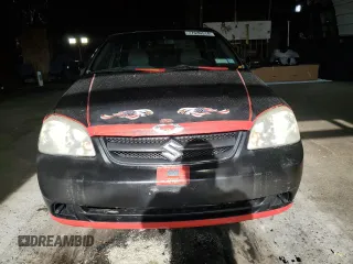 2008 Suzuki Forenza z VIN KL5JD56Z98K859749, wystawiony jako Copart lot #77630514 z przebiegiem 202 609 mil mil oraz Szkody całkowita. Historia ofert i sprzedaży dostępna na DreamBid. Obrazek 5.
