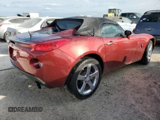 2009 Pontiac Solstice GXP z VIN 1G2MT35X59Y105202, wystawiony jako Copart lot #74429594 z przebiegiem Nie podano mil oraz Szkoda całkowita • Salvage title. Historia ofert i sprzedaży dostępna na DreamBid. Obrazek 3.