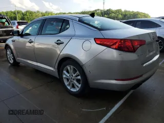 2013 Kia Optima EX z VIN 5XXGN4A72DG165846, wystawiony jako Copart lot #54597195 z przebiegiem 175 218 mil mil oraz Szkoda całkowita • Salvage title. Historia ofert i sprzedaży dostępna na DreamBid. Obrazek 2.