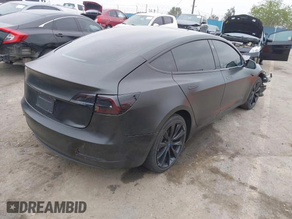 2019 Tesla Model 3 Mid Range with VIN 5YJ3E1EA8KF538083, listed as a IAAI auction lot 41891458 with 46,958 mi miles and . Bid and sale history available at carsss.com. Image 4.