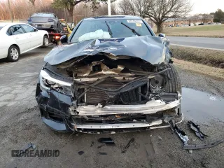 2017 BMW 7 Series 740i with VIN WBA7E2C50HG739520, listed as a Copart auction lot 88144025 with 0 mi miles and Salvage Title. Bid and sale history available at carsss.com. Image 5.