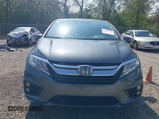 2018 Honda Odyssey EX-L z VIN 5FNRL6H77JB096733, wystawiony jako IAAI lot #42133737 z przebiegiem 165 069 mil mil oraz . Historia ofert i sprzedaży dostępna na DreamBid. Obrazek 12.