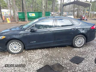 2015 Ford Fusion SE Hybrid with VIN 3FA6P0LU5FR190333, listed as a IAAI auction lot 41802327 with 256,747 mi miles. Bid and sale history available at carsss.com. Image 14.