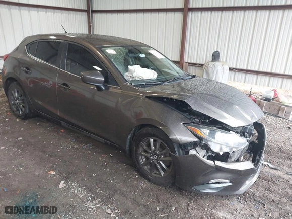 2014 Mazda Mazda3 i Touring with VIN 3MZBM1L75EM109082, listed as a IAAI auction lot 41625740 with 123,618 mi miles. Bid and sale history available at carsss.com. Image 1.