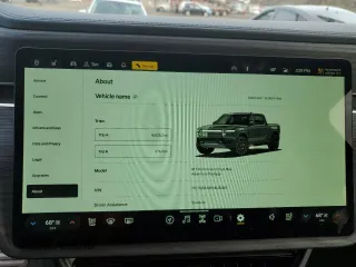 2023 Rivian R1T Adventure z VIN 7FCTGBAA8PN028065, wystawiony jako Copart lot #81941474 z przebiegiem 16 060 mil mil oraz Szkoda całkowita • Salvage title. Historia ofert i sprzedaży dostępna na DreamBid. Obrazek 9.