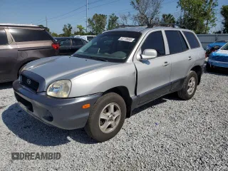 2003 Hyundai Santa Fe GLS z VIN KM8SC13D23U370587, wystawiony jako Copart lot #52775885 z przebiegiem Nie podano mil oraz Szkoda całkowita • Salvage title. Historia ofert i sprzedaży dostępna na DreamBid. Obrazek 1.
