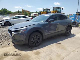 2024 Mazda CX-30 S Carbon Edition z VIN 3MVDMBCM5RM618942, wystawiony jako Copart lot #61708655 z przebiegiem 3 661 mil mil oraz Szkoda całkowita • Salvage title. Historia ofert i sprzedaży dostępna na DreamBid. Obrazek 1.