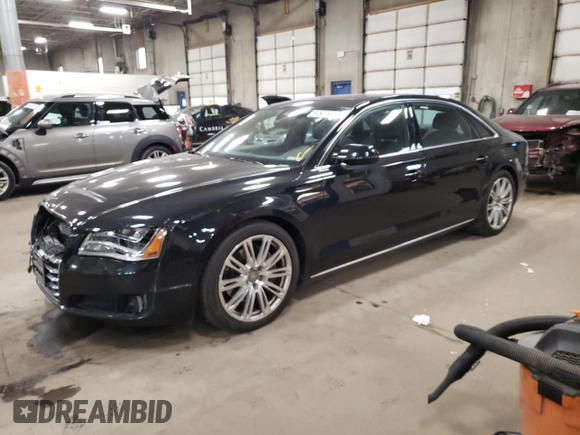 2014 Audi A8 3.0T z VIN WAURGAFD1EN009932, wystawiony jako Copart lot #84607914 z przebiegiem 87 981 mil mil oraz Szkoda całkowita • Salvage title. Historia ofert i sprzedaży dostępna na DreamBid. Obrazek 1.
