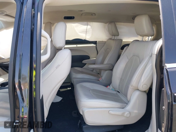 2021 Chrysler Pacifica Hybrid Touring L with VIN 2C4RC1L71MR599631, listed as a IAAI auction lot 42151965 with 67,401 mi miles and . Bid and sale history available at DreamBid. Image 8.